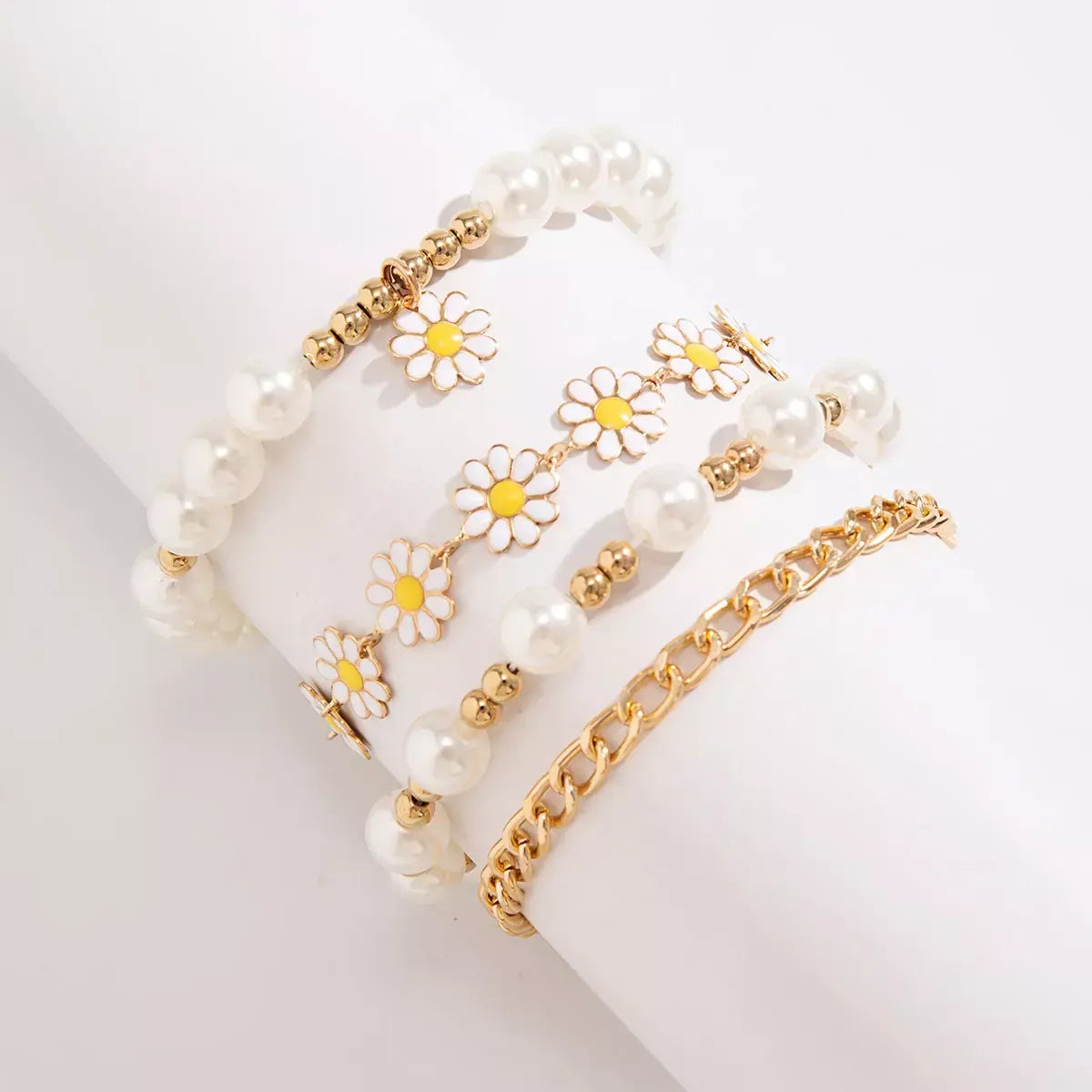 4-piece sunflower pendant bracelet set with floral chain designs.
Close-up of trendy Korean flower chain bracelets with sunflower pendants.
Delicate sunflower pendant bracelet set, perfect for stacking or gifting.
Fashionable Korean-inspired sunflower bracelets in a 4-piece set.