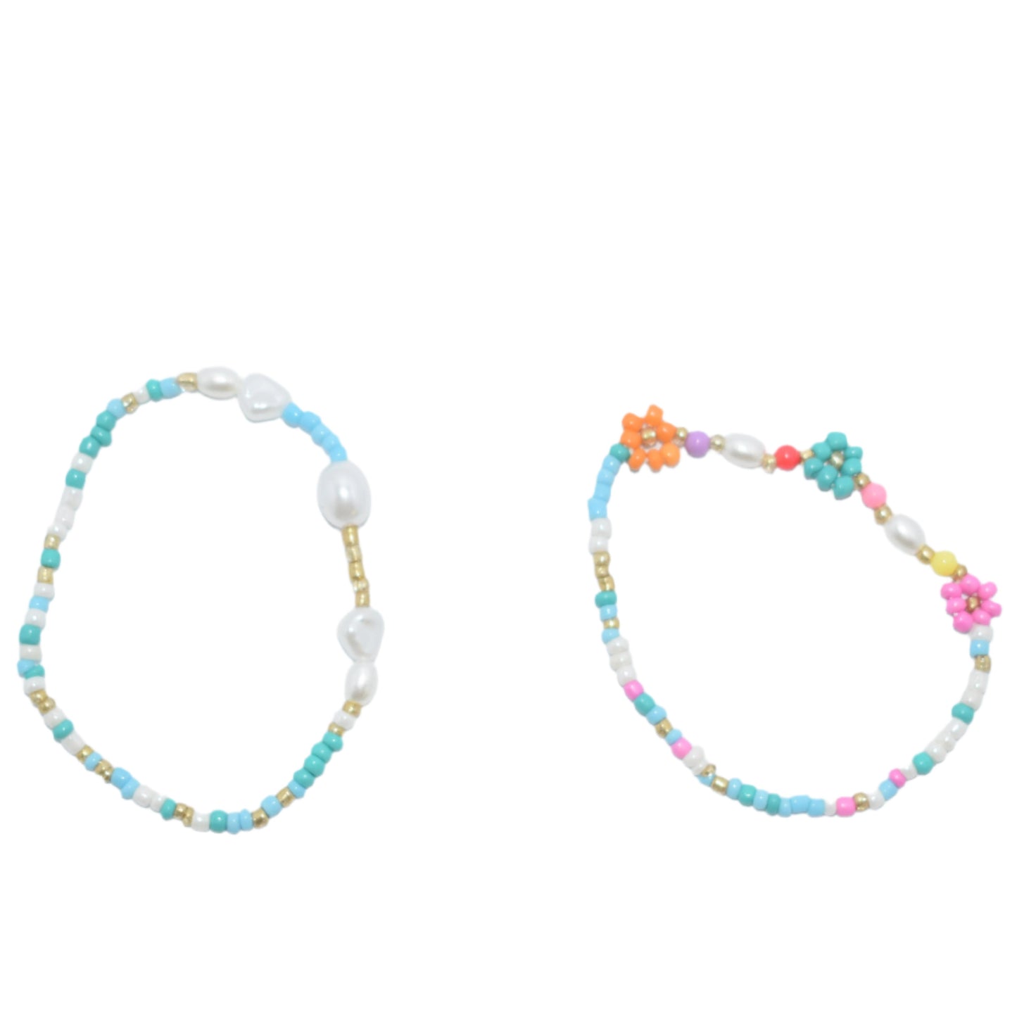 Colorful boho bead bracelet set with flower and pearl accents."
"Close-up of trendy flower and pearl bracelets in a colorful, boho style."
"Bohemian-inspired bracelet set featuring colorful beads, flowers, and pearls."
"Layered bracelet set with colorful beads, floral charms, and pearl accents."