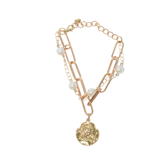Double layer pearl embossed bracelet with European alloy design."
"Close-up of elegant double layer pearl bracelet with embossed detailing."
"Stylish double layer bracelet with pearls and embossed European alloy."
"Pearl and embossed design double layer bracelet for women."
"Elegant European alloy bracelet with double layer and pearl accents."